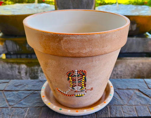 Hand-painted garden art by Happy Moose Garden Art