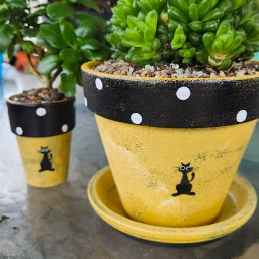 Hand-painted garden art by Happy Moose Garden Art