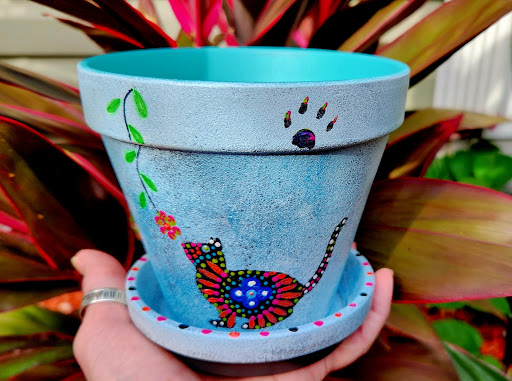 Hand-painted garden art by Happy Moose Garden Art
